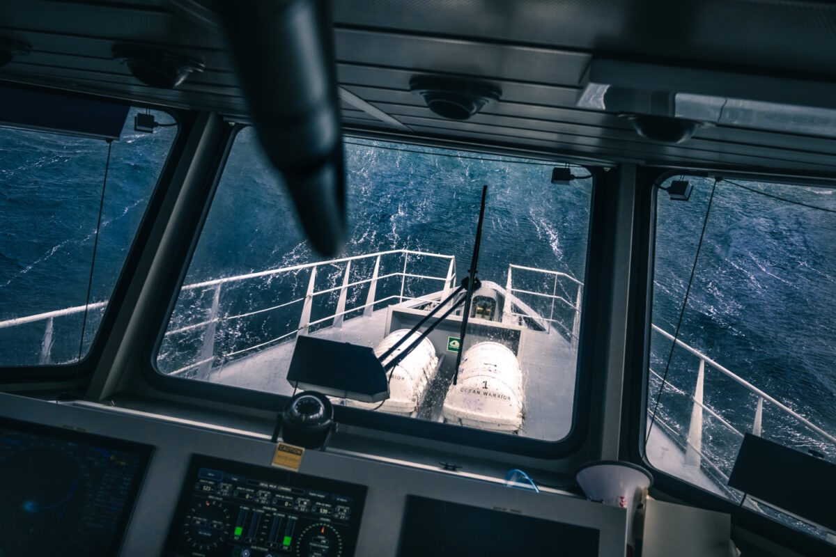 View from the bridge of the Ocean Warrior while transiting south along the west coast of Latin America to investigate a squid fishing fleet. The sea and waves were brutal, putting the crew to a serious test.